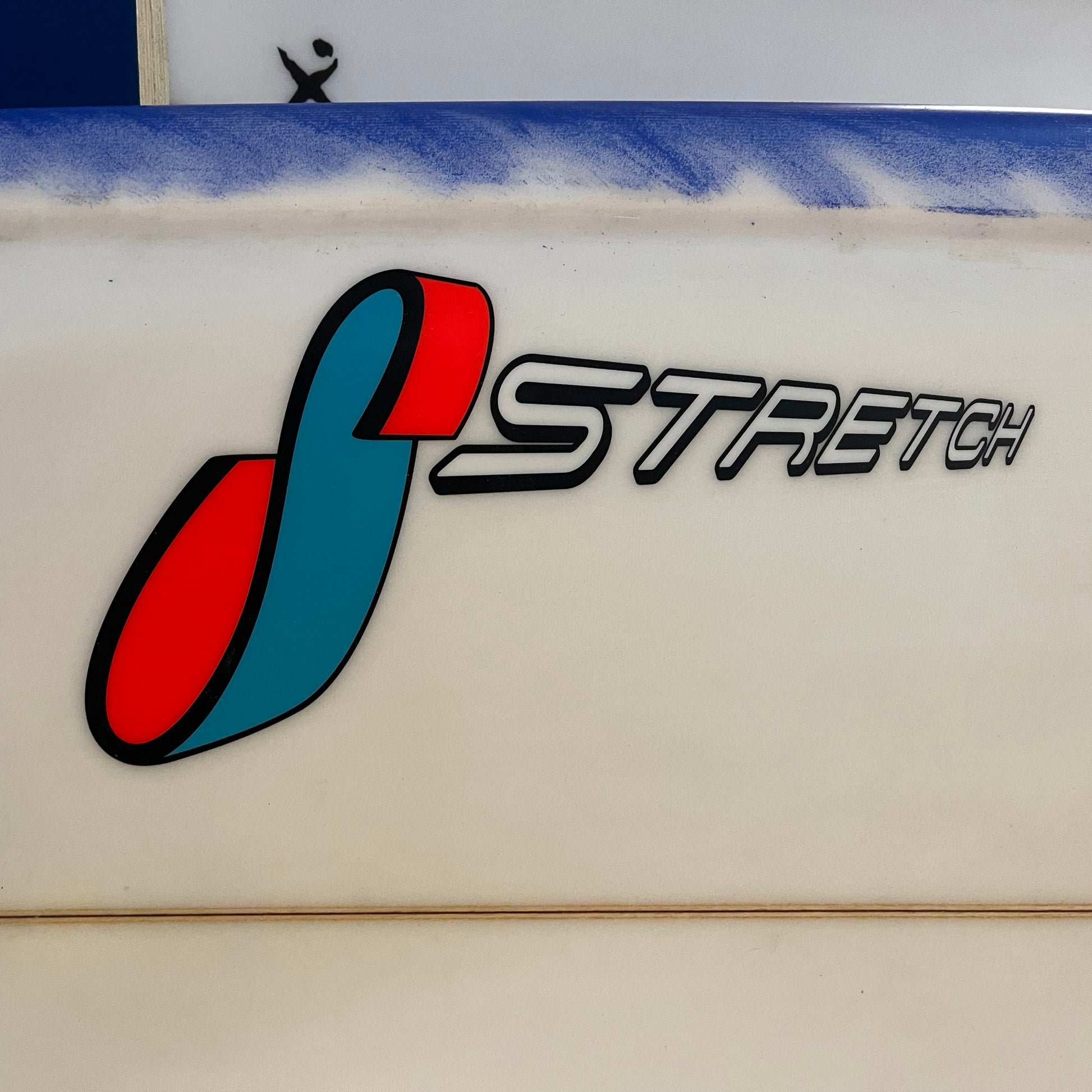 Stretch IT 7'4" secondhand surfboard brand logo close-up