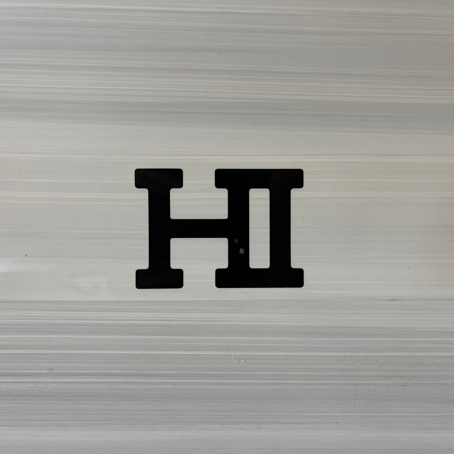 Tolhurst HI Mid 6 6'8" secondhand surfboard model logo close-up