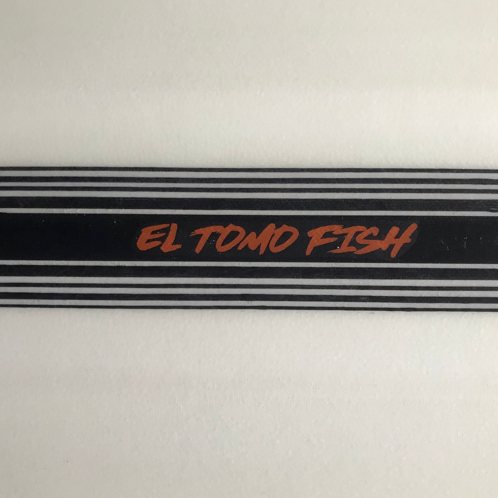 Tomo El Tomo Fish 5'9" secondhand surfboard model logo close-up