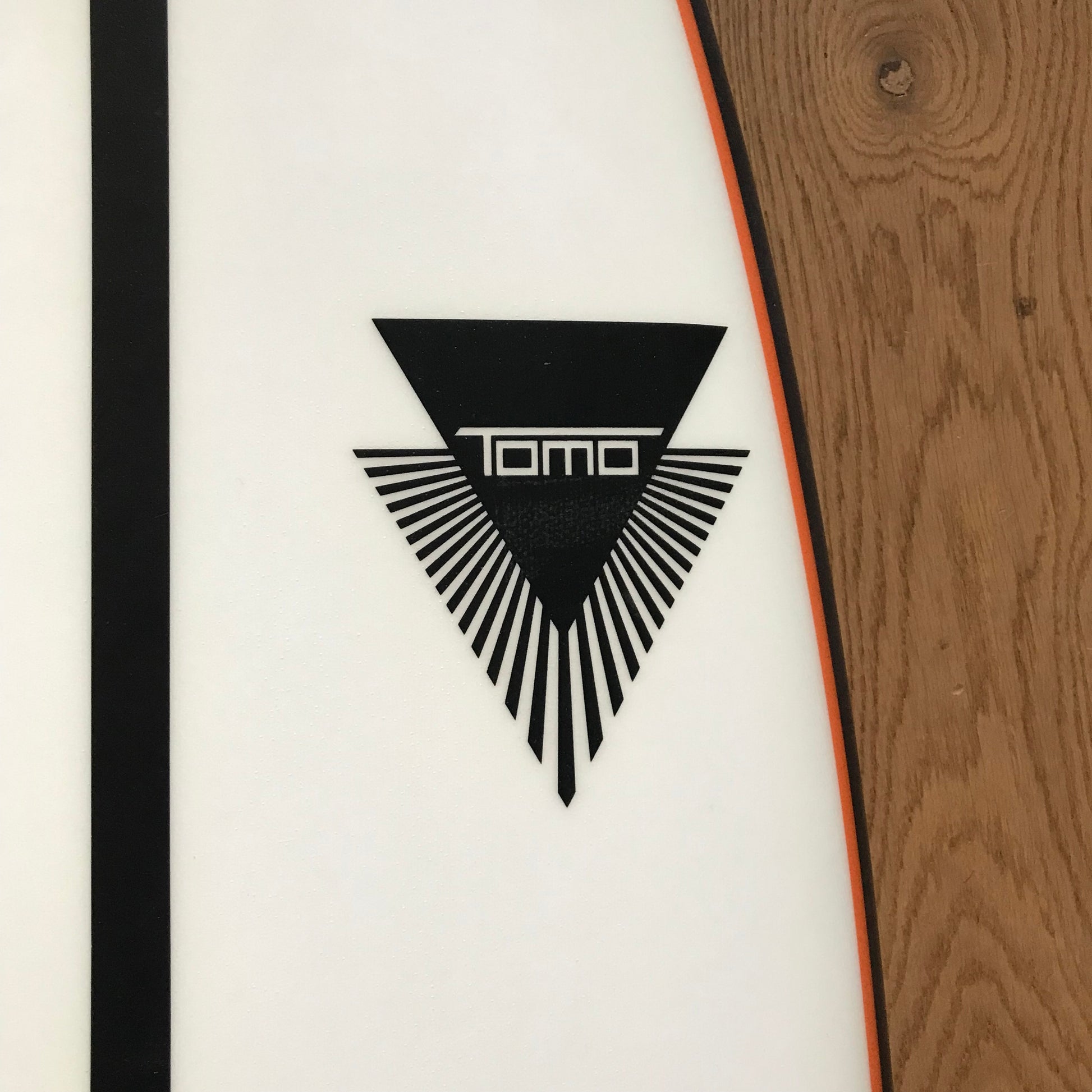 Tomo El Tomo Fish 6'0" secondhand surfboard brand logo close-up