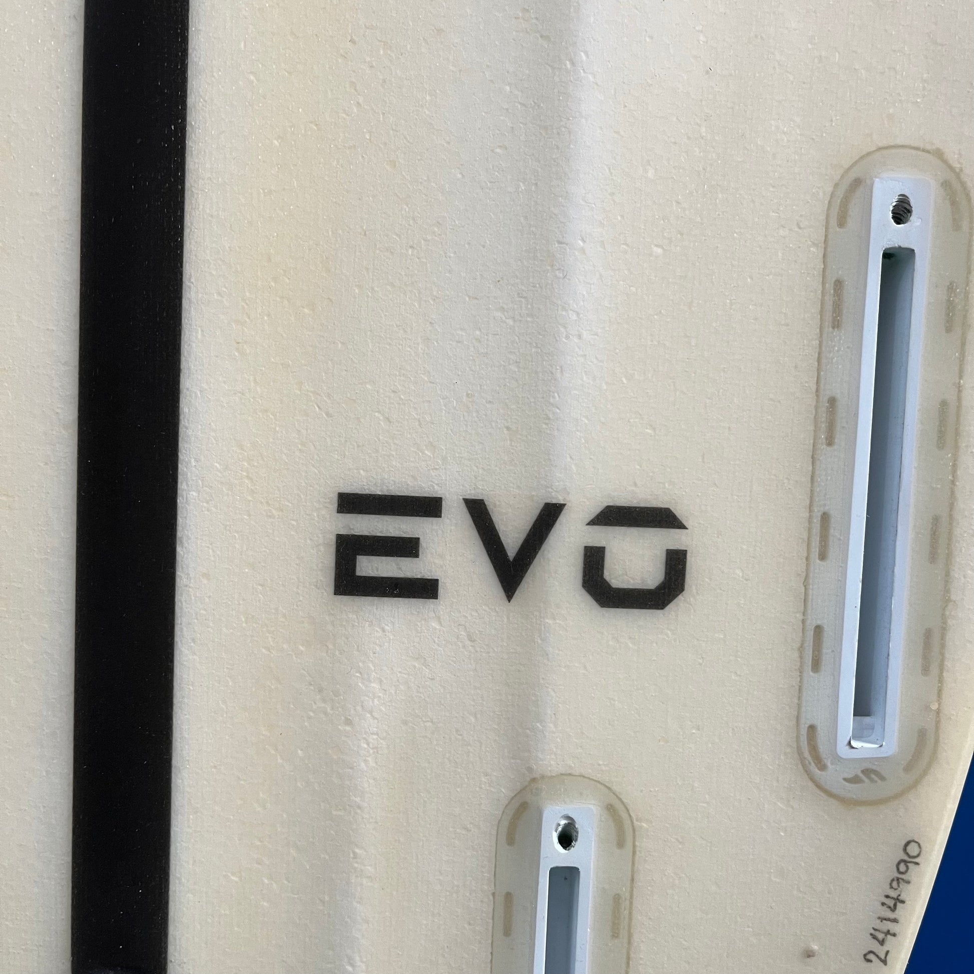 Tomo Evo 5'6" secondhand surfboard model logo close-up