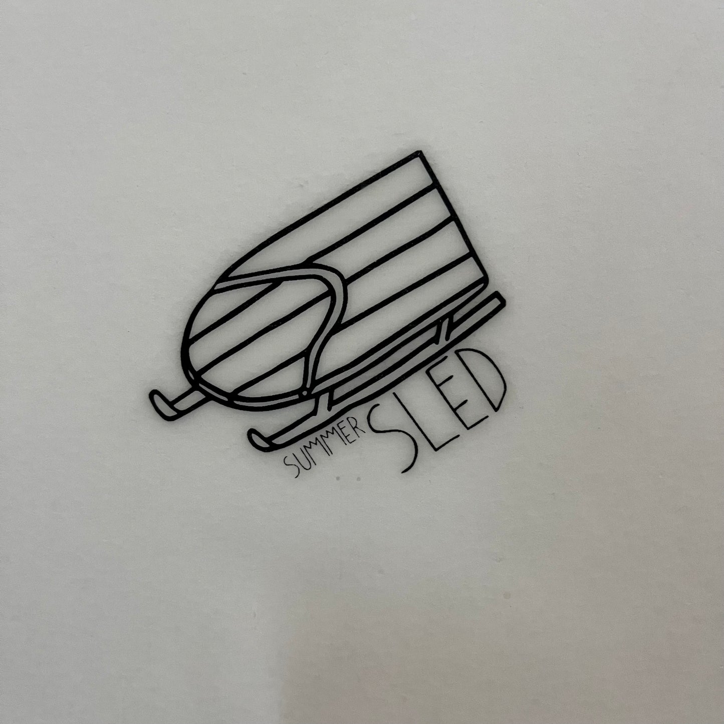 Toniq Summer Sled 5'6" secondhand surfboard model logo close-up