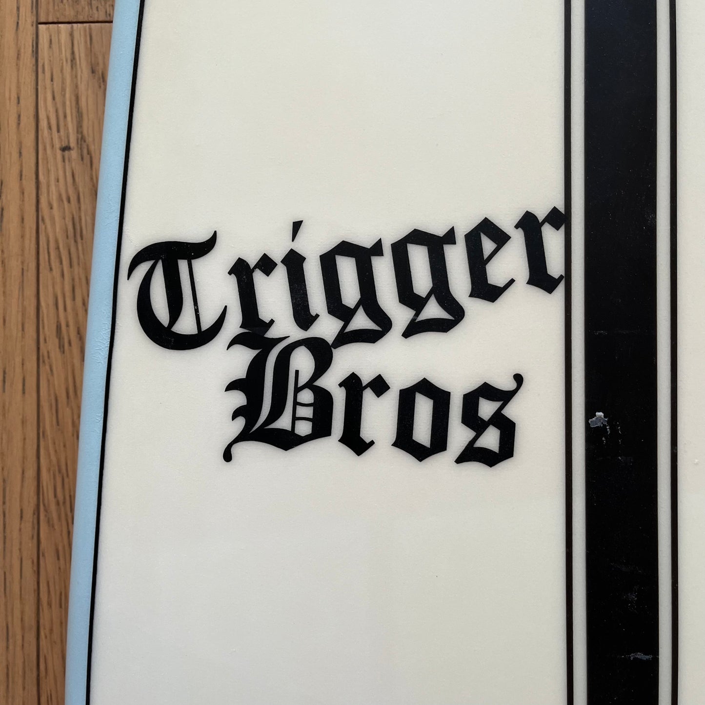 Trigger Bros The Nuke 5'8" secondhand surfboard brand logo close-up