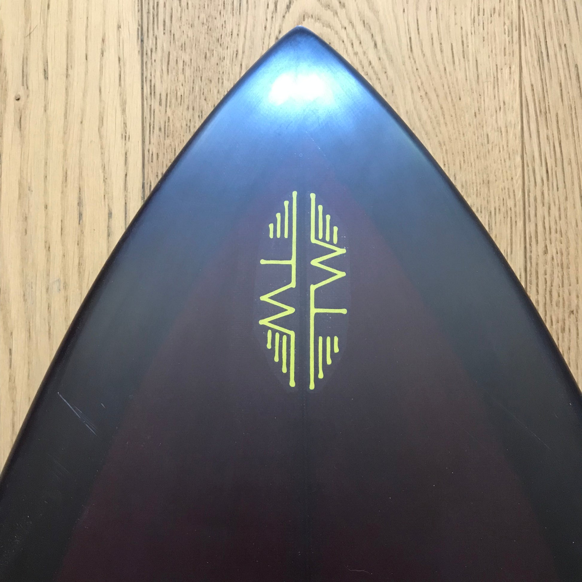 Tyler Warren Shapes Quadratic Formula 5'11" secondhand surfboard brand logo close-up