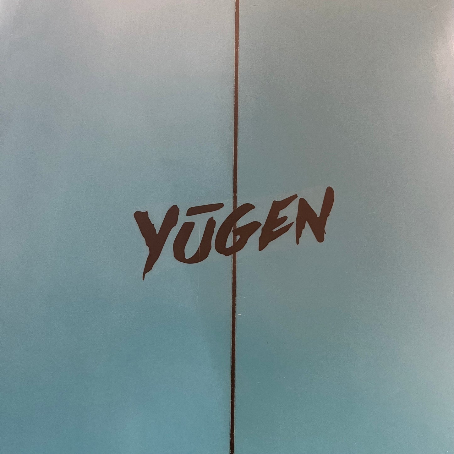 Yugen Buri 5'8" secondhand surfboard brand logo close-up