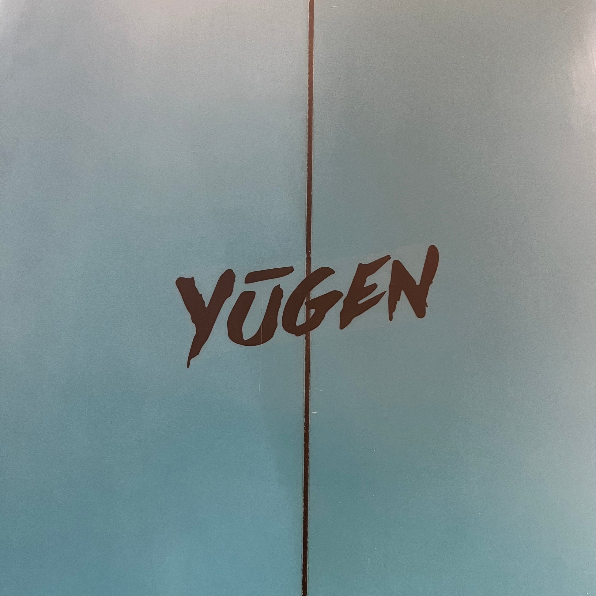 Yugen Buri 5'8" secondhand surfboard brand logo close-up