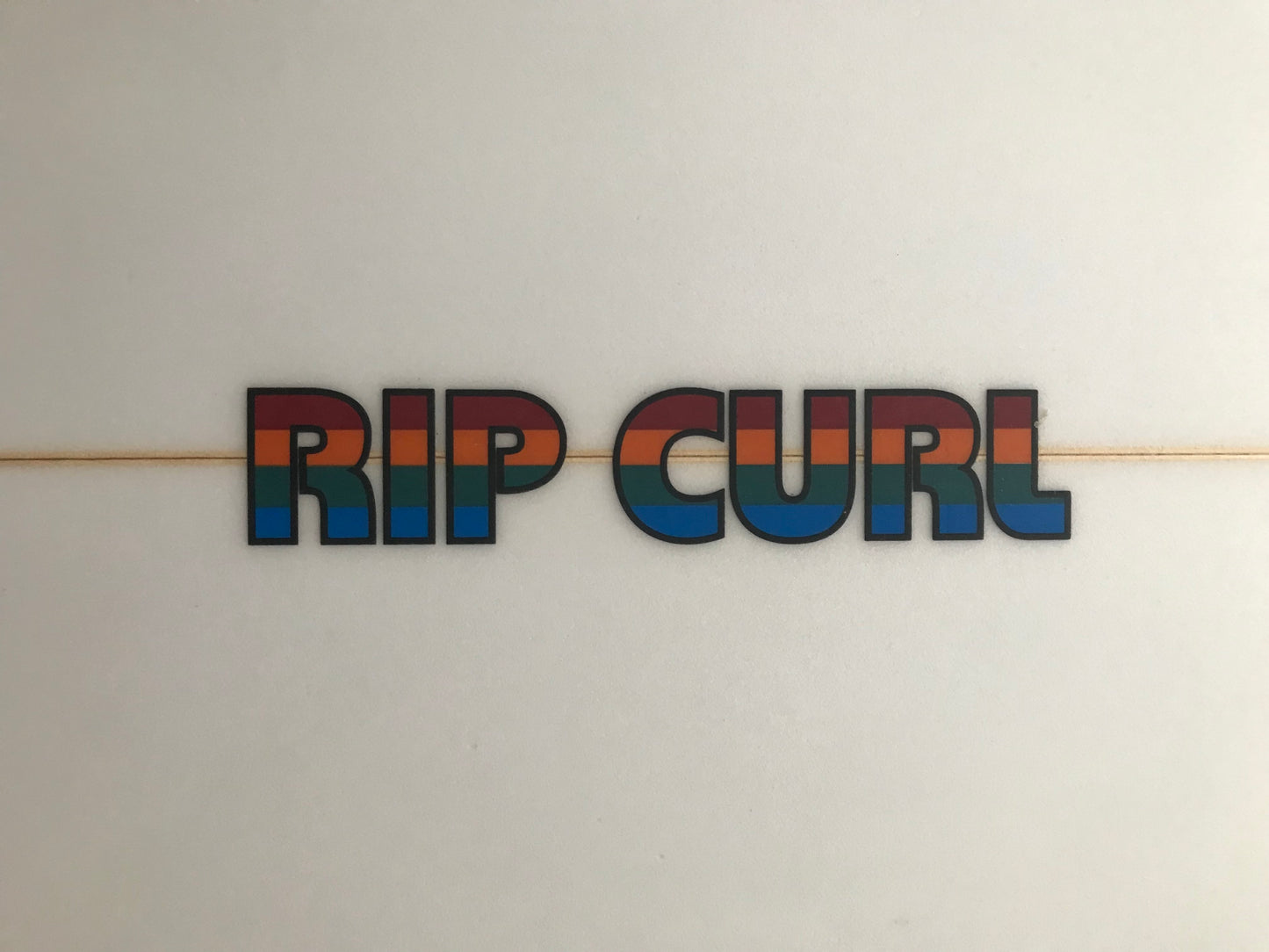 Rip Curl twin fin 5'6" secondhand surfboard brand logo close-up
